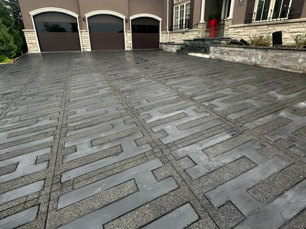 close up of a heated driveway in front of a house