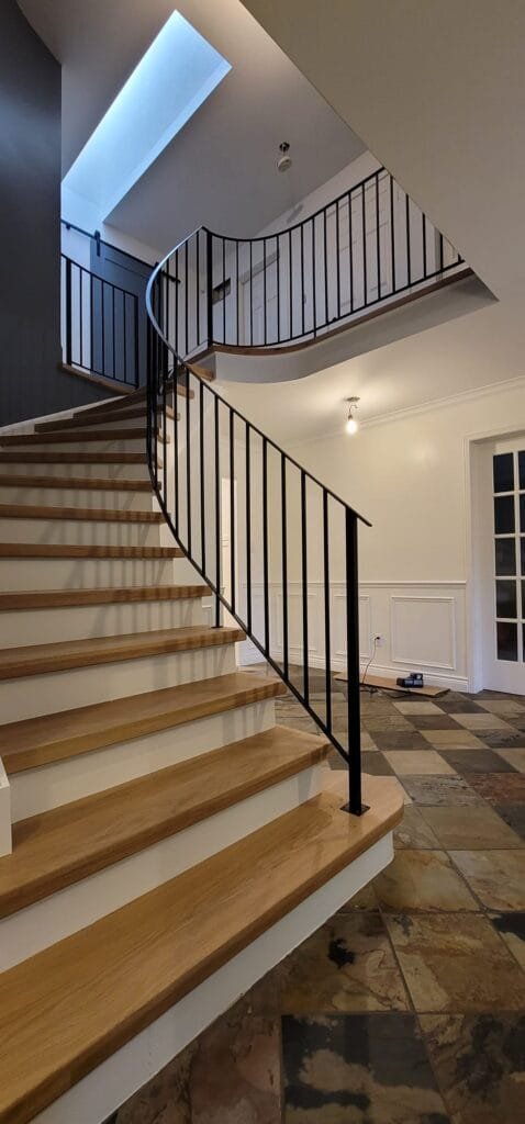 interior renovation staircase with skylight in roof